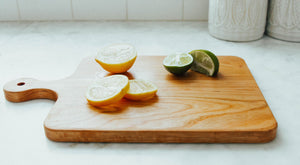 Momentum - Solid Cherry Cutting Board with Rounded Handle