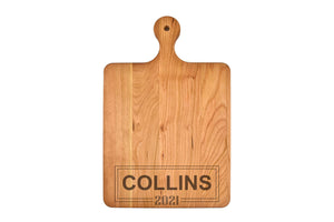 Momentum - Solid Cherry Cutting Board with Rounded Handle