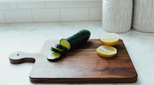 Load image into Gallery viewer, Momentum - Solid Walnut Cutting Board with Rounded Handle