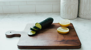 Momentum - Solid Walnut Cutting Board with Rounded Handle